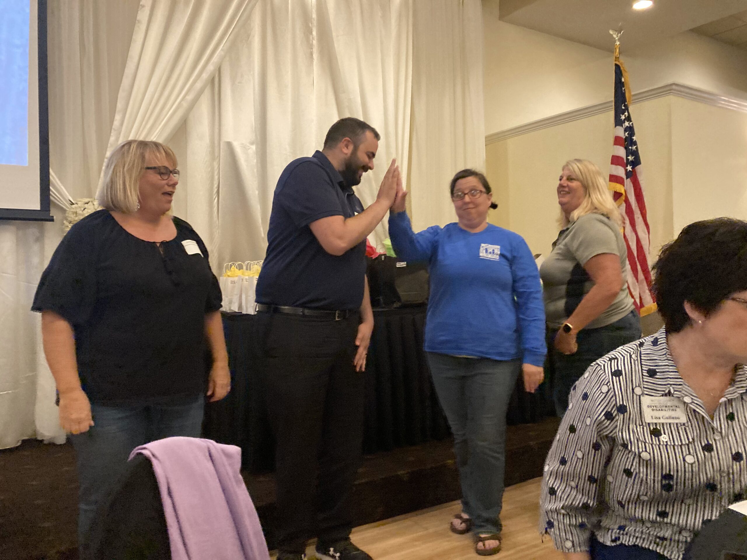 BCBDD staff members participating in a team building activity at the All-Staff Meeting at Receptions in Fairfield.