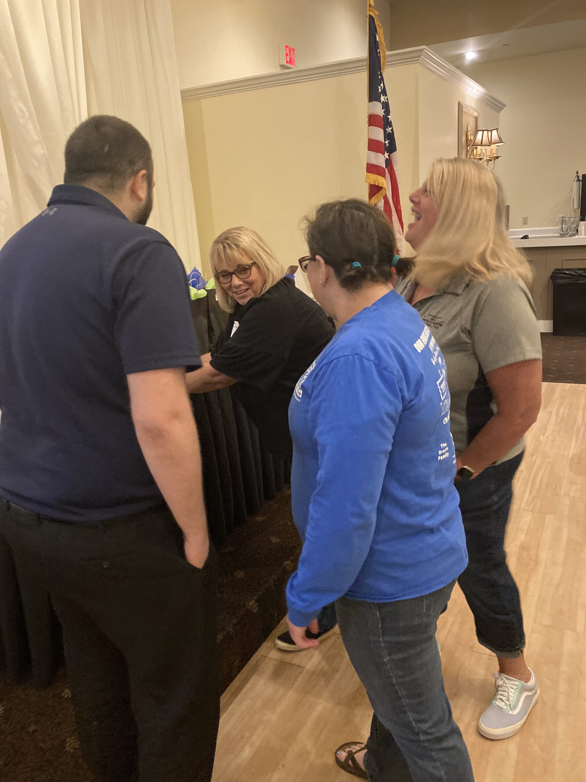 BCBDD staff members participating in a team building activity at the All-Staff Meeting at Receptions in Fairfield.