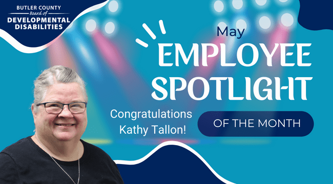 A graphic with a spotlight and a woman with text that reads, "May Employee Spotlight of the month, Congratulations, Kathy Tallon!"